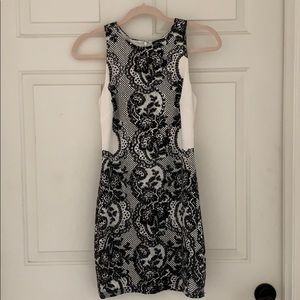 White dress with elegant black design
